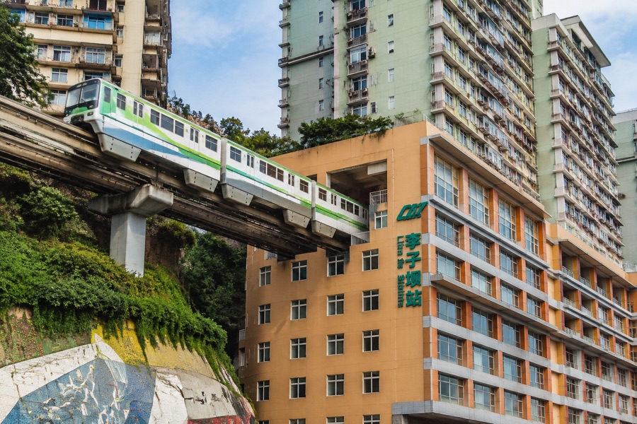Liziba Monorail Passing Through Residential Apartment Building